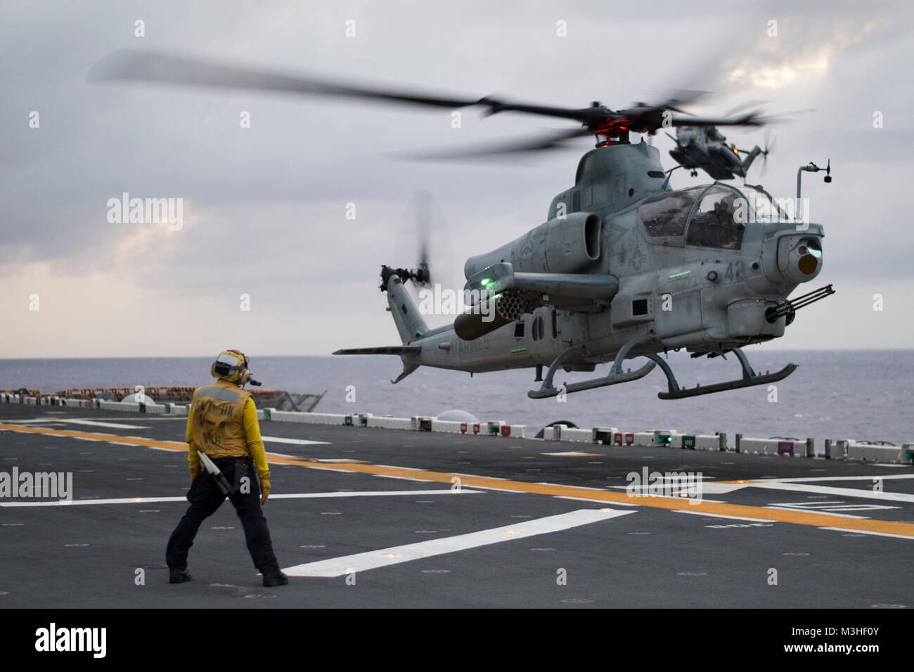 PHILIPPINE SEA (Feb. 4, 2018) An AH-1Z Viper helicopter assigned to the 'Gunfighters' of Marine Light Attack Helicopter Squadron (HMLA) 369 lands on the flight deck of the amphibious assault ship USS Bonhomme Richard (LHD 6). Bonhomme Richard is operating in the Indo-Asia-Pacific region as part of a regularly scheduled patrol and provides a rapid-response capability in the event of a regional contingency or natural disaster. (U.S. Navy Stock Photo
