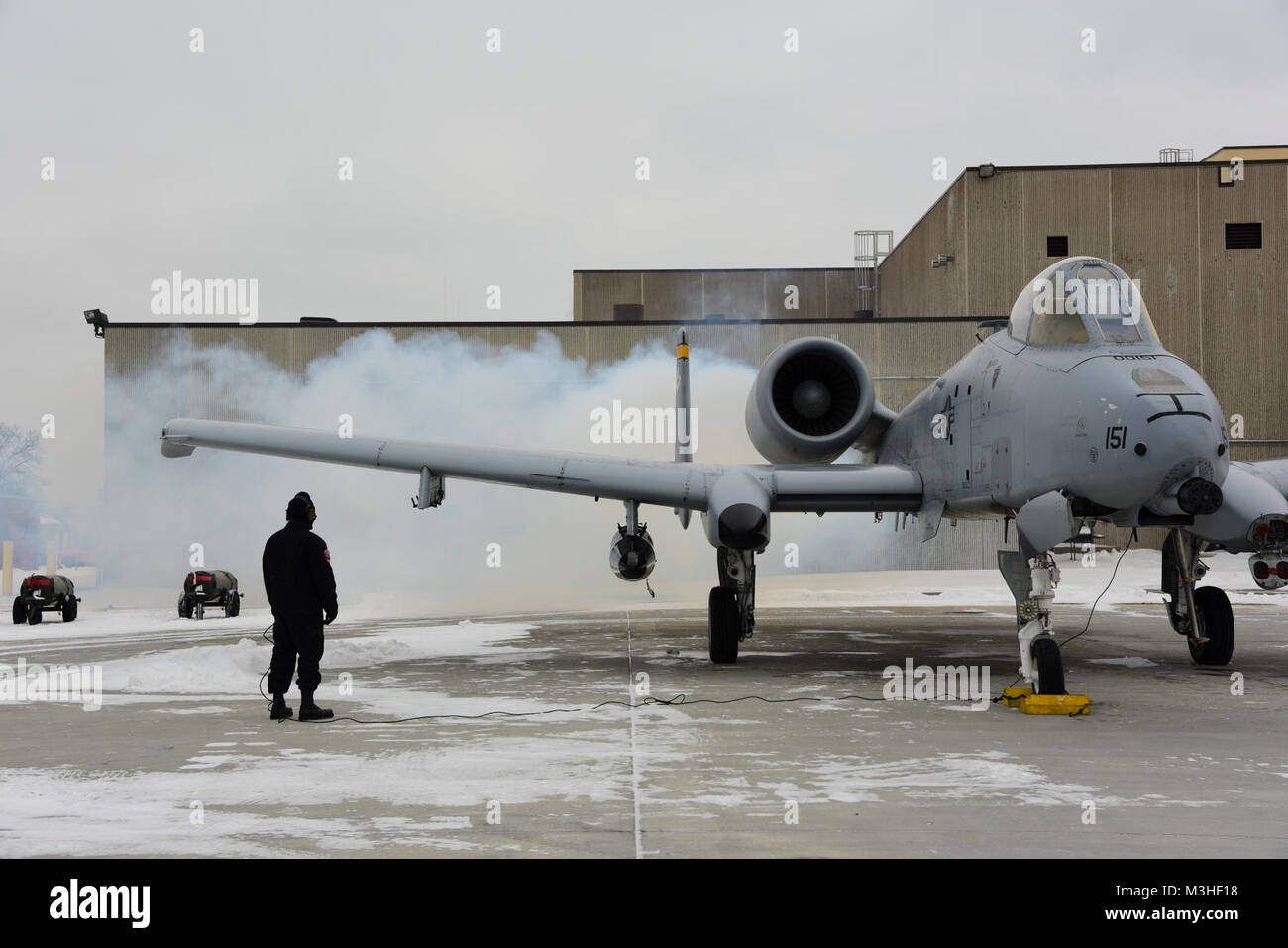 U.S. Air Force Staff Sgt. Andre Gonzales, A-10C Thunderbolt II Demonstration Team avionics systems craftsman, conducts startup procedures with Capt. Cody Wilton, A-10 Demo Team commander, prior to a flight at Minneapolis-St. Paul Air Reserve Station, Minn., Feb. 5, 2018. The A-10 Demo Team visited Minneapolis to support a Air Force Heritage Flight flyover for Super Bowl 52. (U.S. Air Force Stock Photo