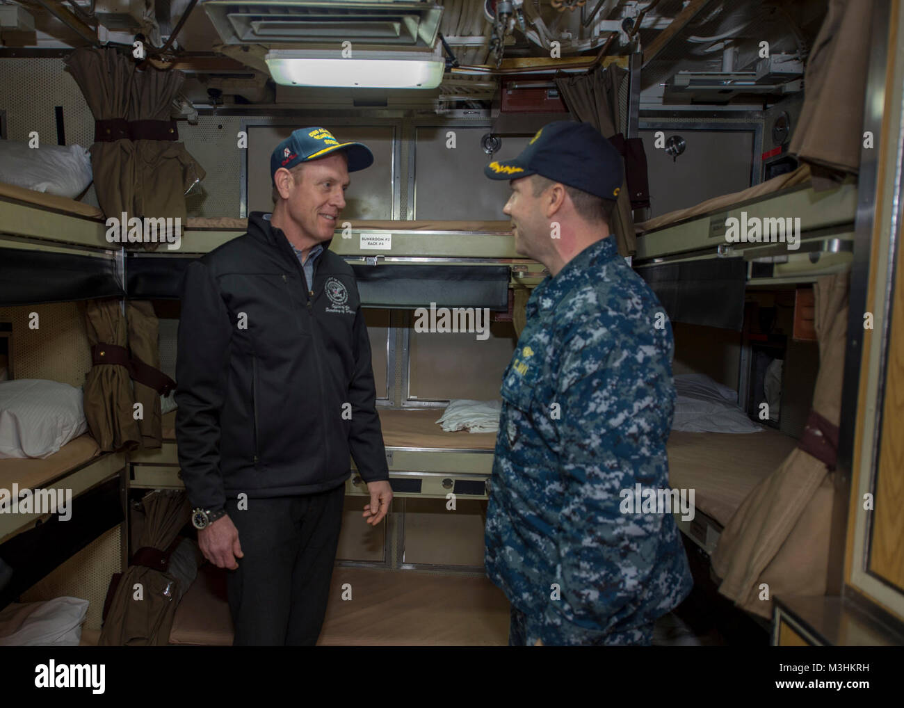 BANGOR, Wash. (Feb. 9, 2018) Cmdr. Jeffery Yackeren commanding officer to Ohio-class ballistic missile submarine USS Alabama (SSBN 731), shows  Deputy Secretary of Defense Patrick Shanahan sailors living quarters. Alabama is one of eight ballistic-missile submarines stationed at the base, providing the most survivable leg of the strategic deterrence triad for the United States.   (U.S. Navy Stock Photo