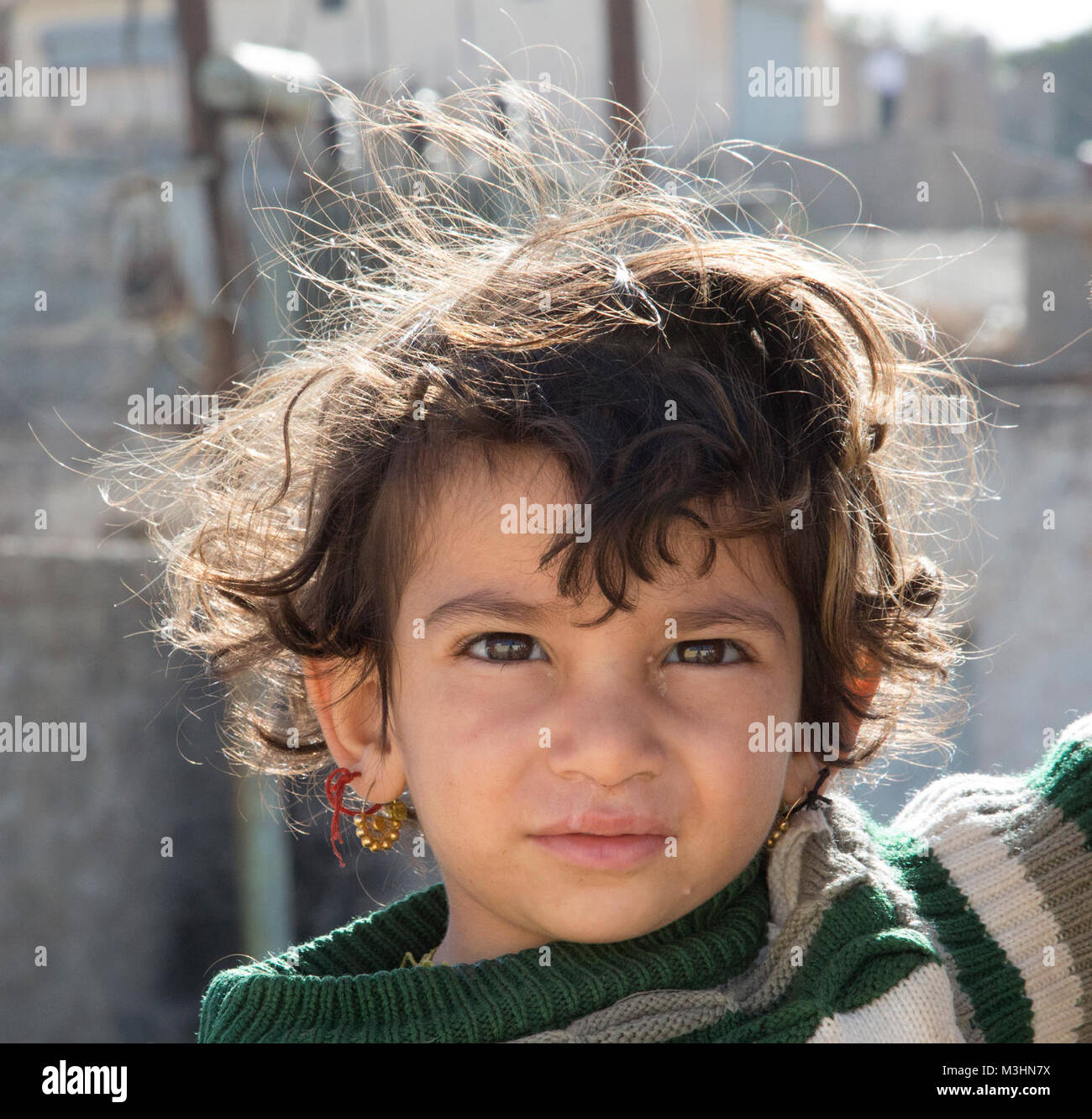 A Young Iraqi Girl Poses For A Stock Photo - Alamy