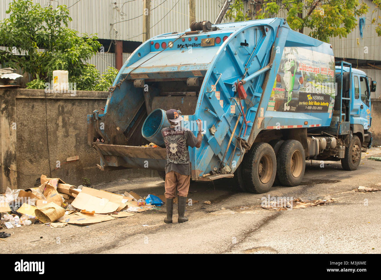 Garbage truck clearing up after the market at Ocho Rios, Jamaica, West