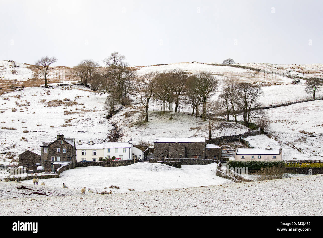 The village of Troutbeck snow covered after overnight snow in the English Lake District, Cumbria, UK Stock Photo