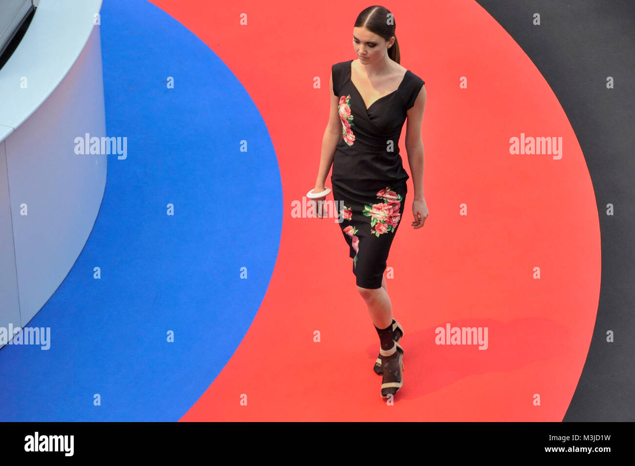London, UK. 11 February 2018. A model on the Future Stage catwalk. Pure London, the UK's largest trade buying fashion event for womenswear, menswear, footwear and accessories from emerging and established designers, opens at Kensington Olympia showcasing the latest trends for AW18/19. Credit: Stephen Chung / Alamy Live News Stock Photo
