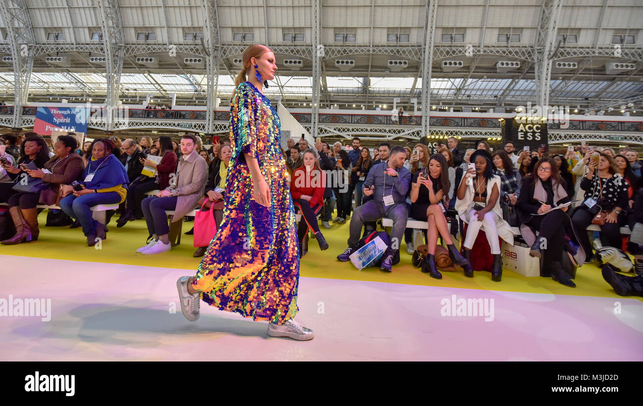 London, UK.  11 February 2018. A model on the main stage catwalk. Pure London, the UK's largest trade buying fashion event for womenswear, menswear, footwear and accessories from emerging and established designers, opens at Kensington Olympia showcasing the latest trends for AW18/19.  Credit: Stephen Chung / Alamy Live News Stock Photo