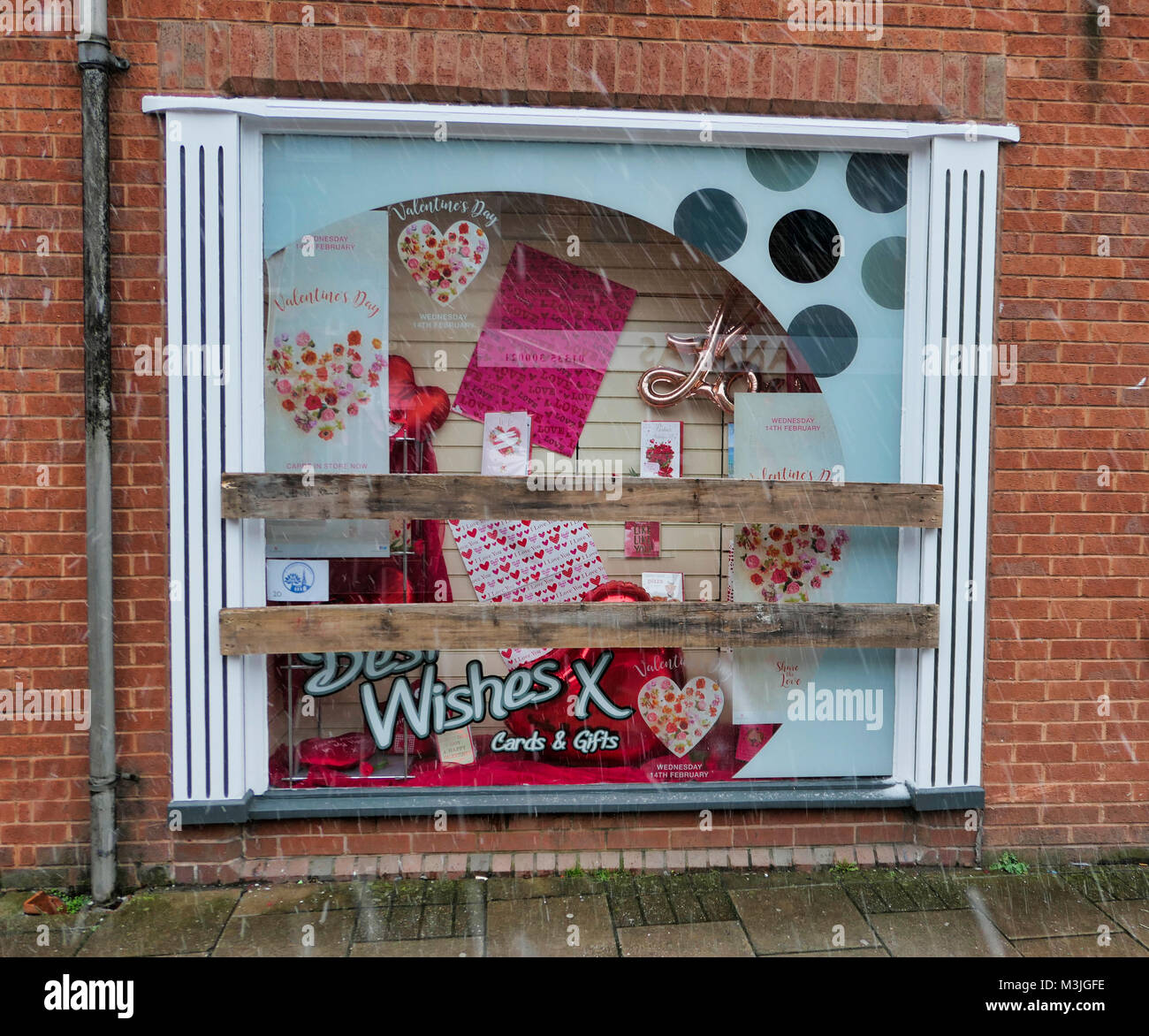 Ashbourne, UK. 11th February, 2018. All boarded up. Ashbourne town centre shop windows are boarded up for the start for the Ashbourne Royal Shrovetide Football match which takes place on Shrove Tuesday & Ash Wednesday every year.  game is the forerunner to football dating from 1683 when Charles Cotton's poem Burlesque upon the Great Frost, cousin of Aston Cockayne Baronet of Ashbourne, DerbyshirePreparations start for the Ashbourne Royal Shrovetide Football match which takes place on Shrove Tuesday & Ash Wednesday every year. Credit: Doug Blane/Alamy Live News Stock Photo