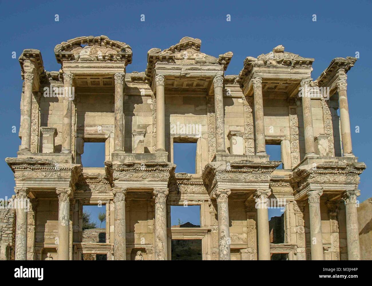 Ephesus, Izmir, Turkey. 1st Oct, 2004. The Library of Celsus, a tomb for the Roman governor of the province of Asia, built in 117 A.D. is one of the most beautiful and most photographed structures in Ephesus. An ancient Greek city on the Ionian coast, dating to the 10th century BC, Ephesus was a religious, cultural and commercial center noted for its temples and architecture. Its ruins are now a favorite international tourist attraction and a UNESCO World Heritage Site. Credit: Arnold Drapkin/ZUMA Wire/Alamy Live News Stock Photo