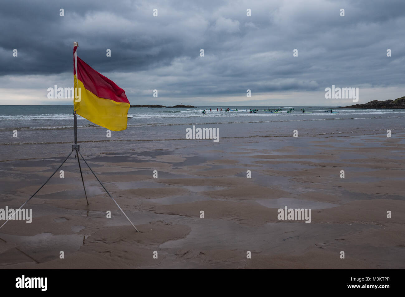 Yellow flag on beach hires stock photography and images Alamy