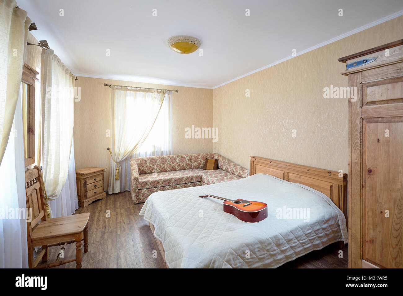 Rural Room With Guitar On Bed Stock Photo Alamy Rural Room With Guitar On Bed Stock Photo Alamy