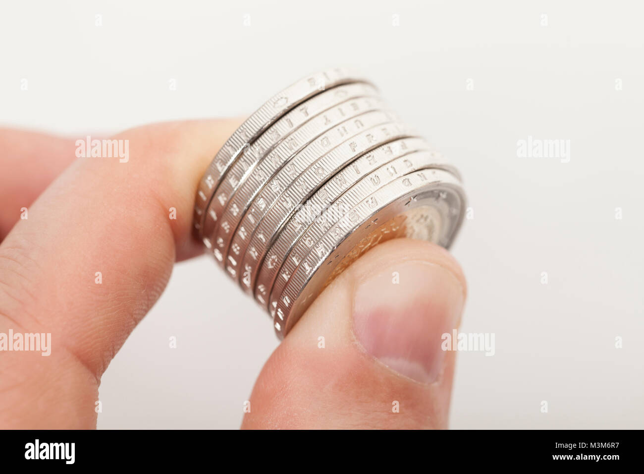 Euro Münzen in Hand halten Stock Photo