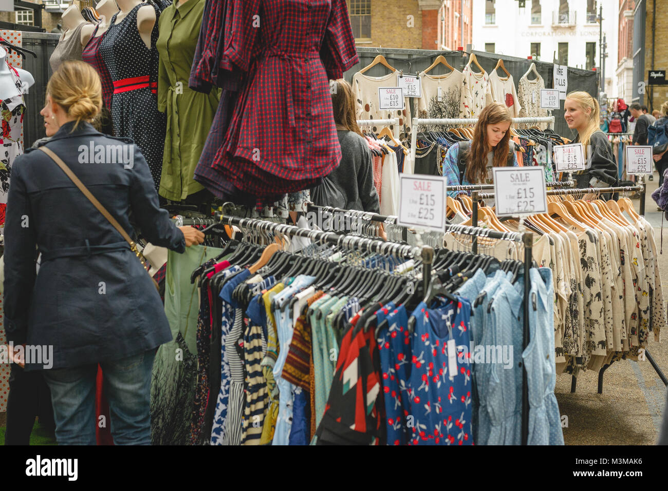 Vintage clothes stall in Spitalfields Market. East London (UK), August 2017. Landscape format. Stock Photo