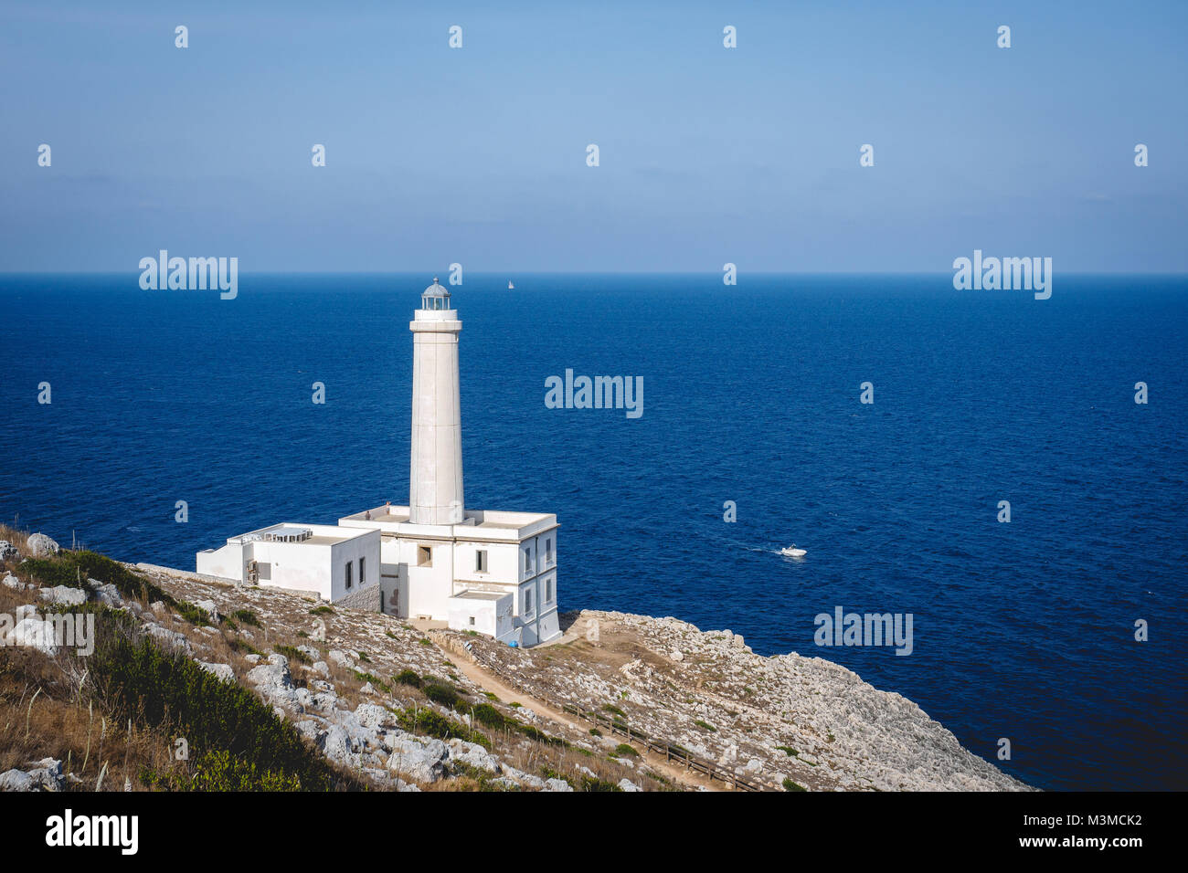 Otranto (Italy), August 2017. The lighthouse at Cape Palascia, near the Apulian town of Otranto, Italy's most easterly point. Landscape format. Stock Photo