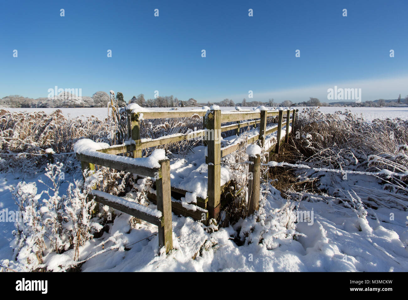 Village of Coddington, England. Picturesque view of a snow covered