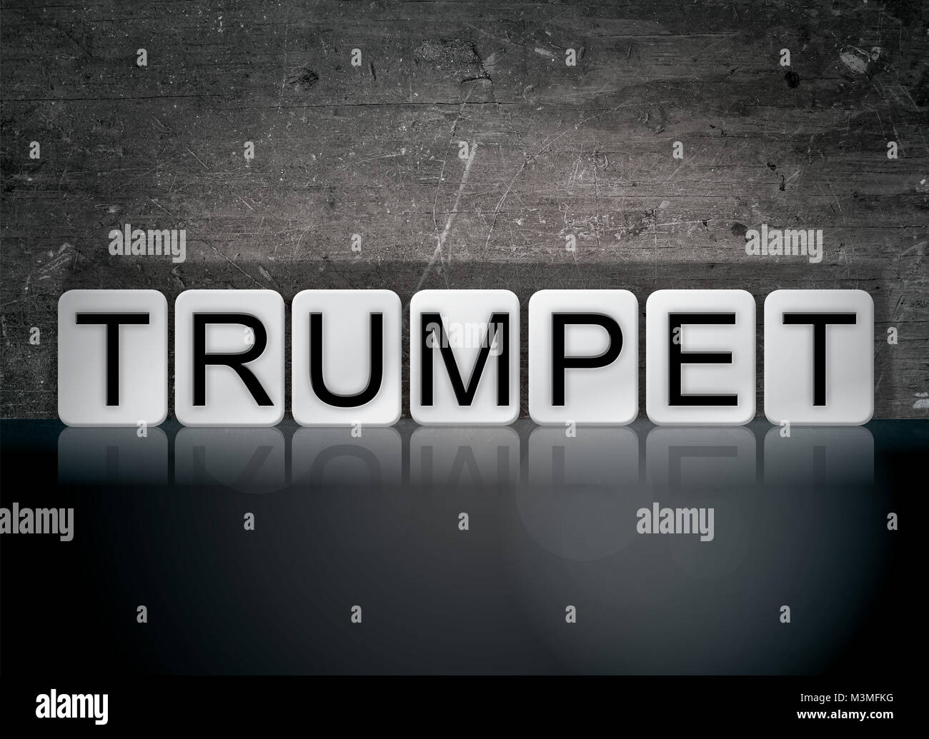 The word Trumpet concept and theme written in white tiles on a dark background. Stock Photo