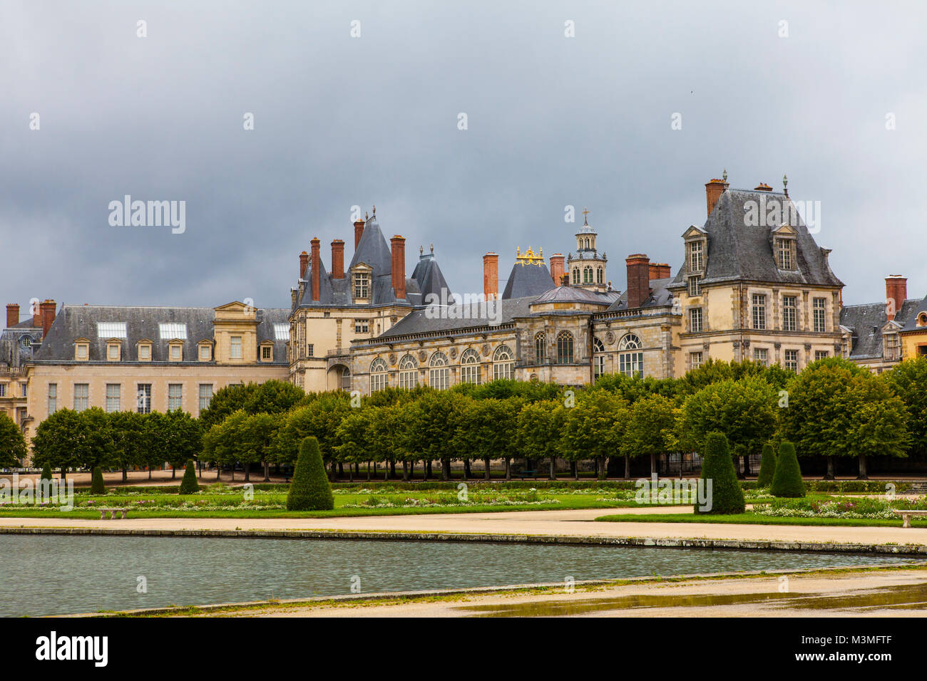 Royal hunting castle Fontainbleau. Palace of Fontainebleau - one of largest royal chateaux in France (55 km from Paris), UNESCO World Heritage Site. Stock Photo