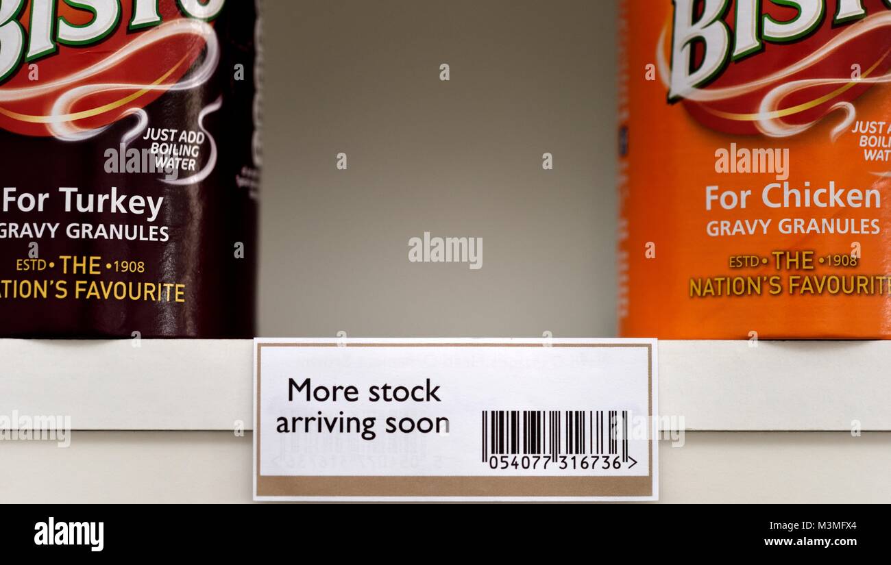 out of stock label on a store shelf more stock arriving soon Stock Photo