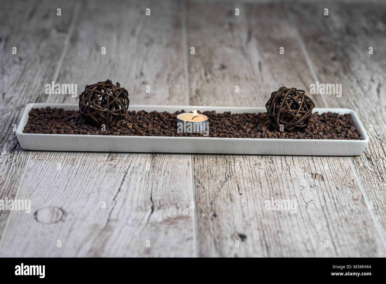 Beautiful and discreet decoration for nice moments on a wooden table. Stock Photo