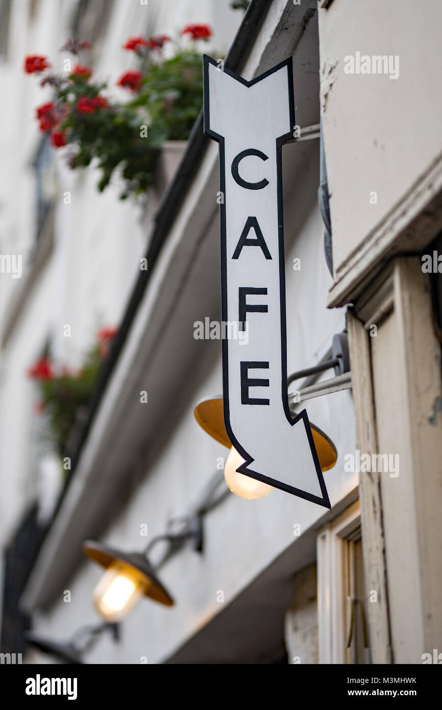 Vintage style coffee sign on a brick wall Stock Photo