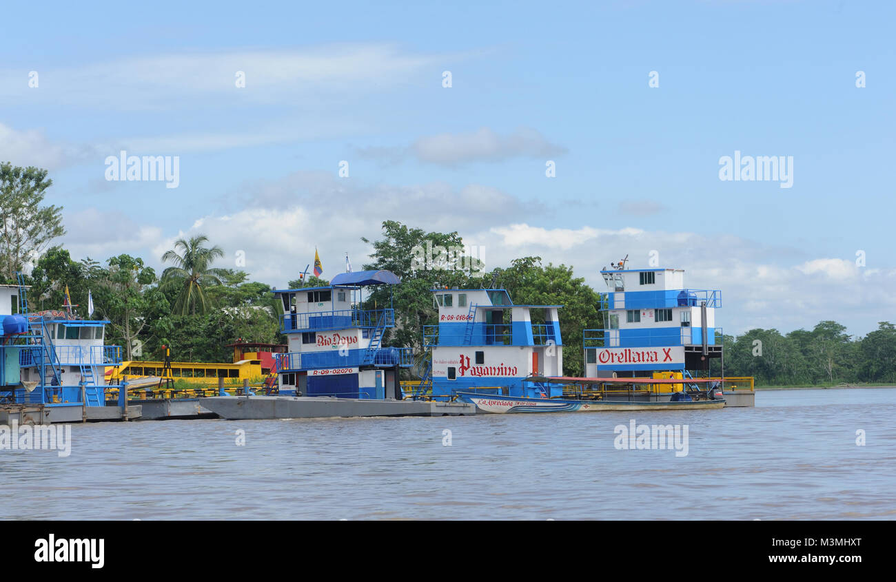 Three decked tug boats on the Napo River near Coca or Puerto Francisco de Orellana. Coca, Puerto Francisco de Orellana, Orellana, Ecuador. Stock Photo