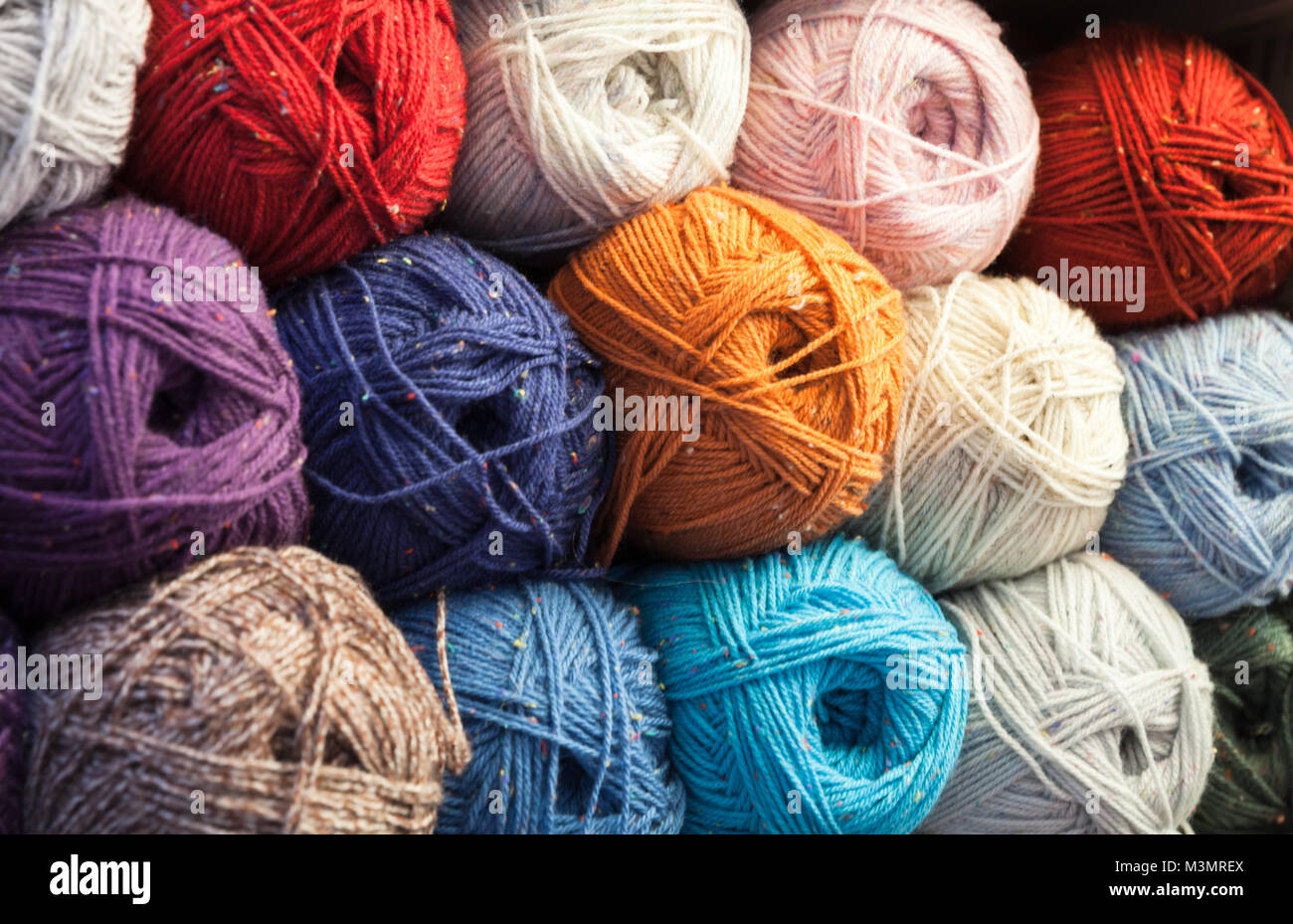 Colorful balls of wool, close up background photo Stock Photo