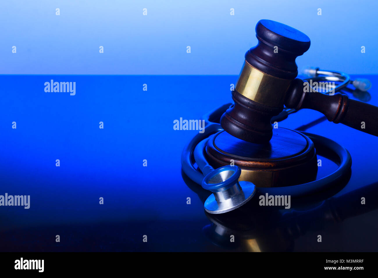 Hand holding law gavel Stock Photo Alamy