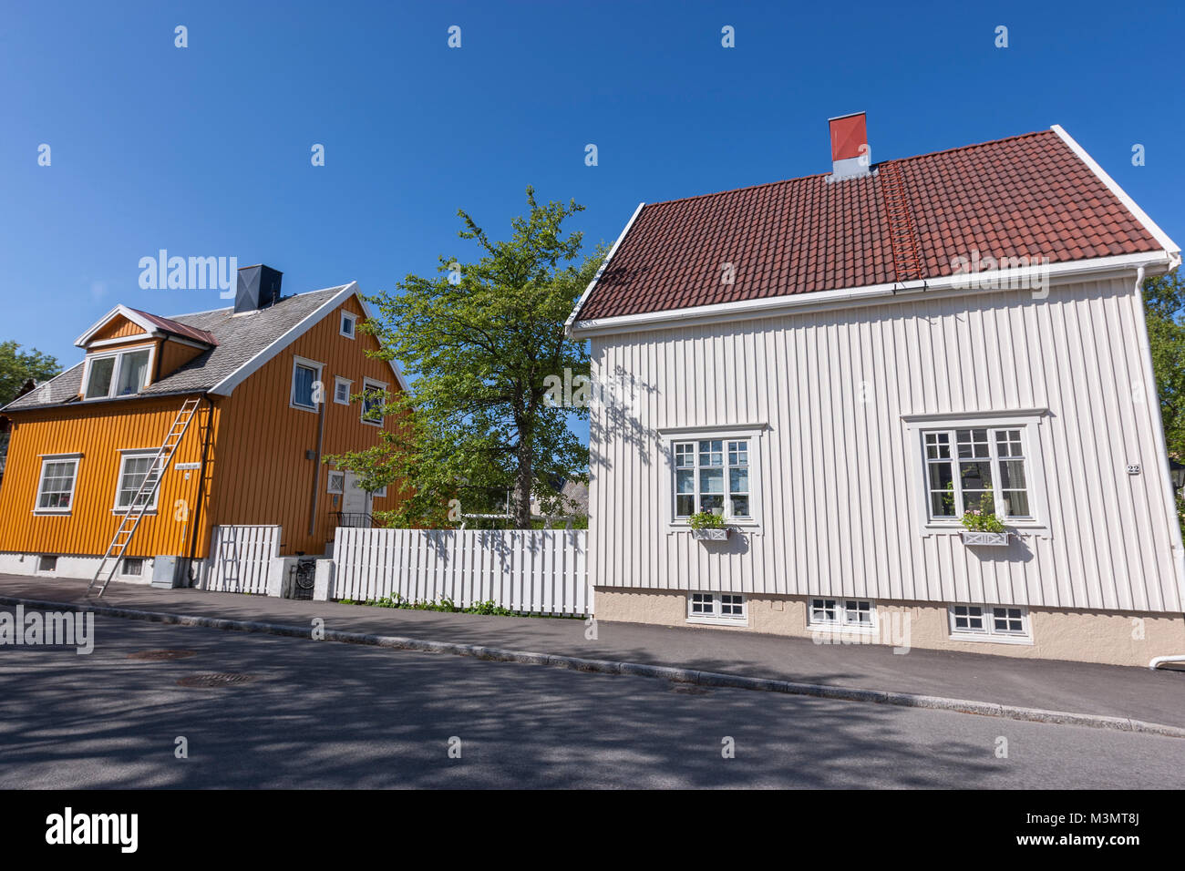 White wooden houses in a residential area in Bodo, Norway Stock Photo