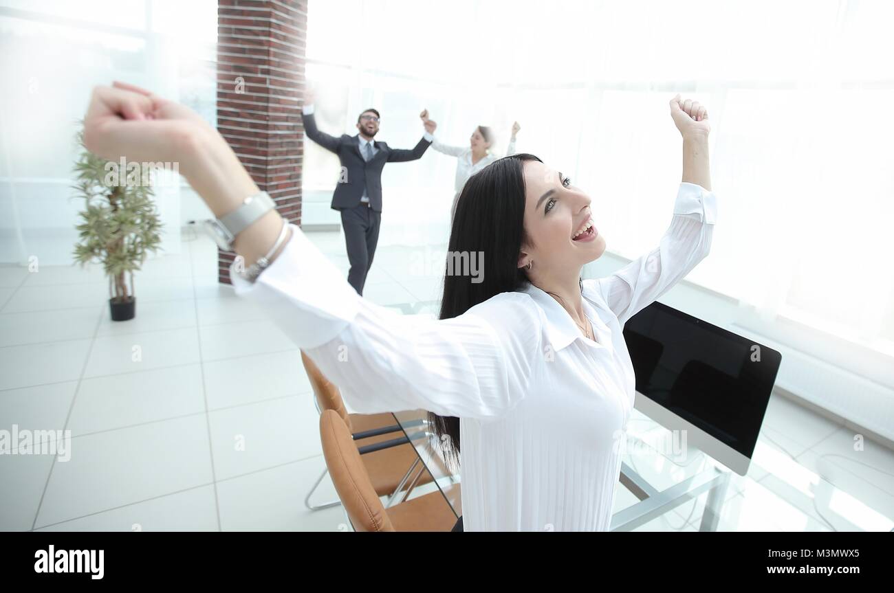 successful happy business woman sitting at the desk Stock Photo - Alamy