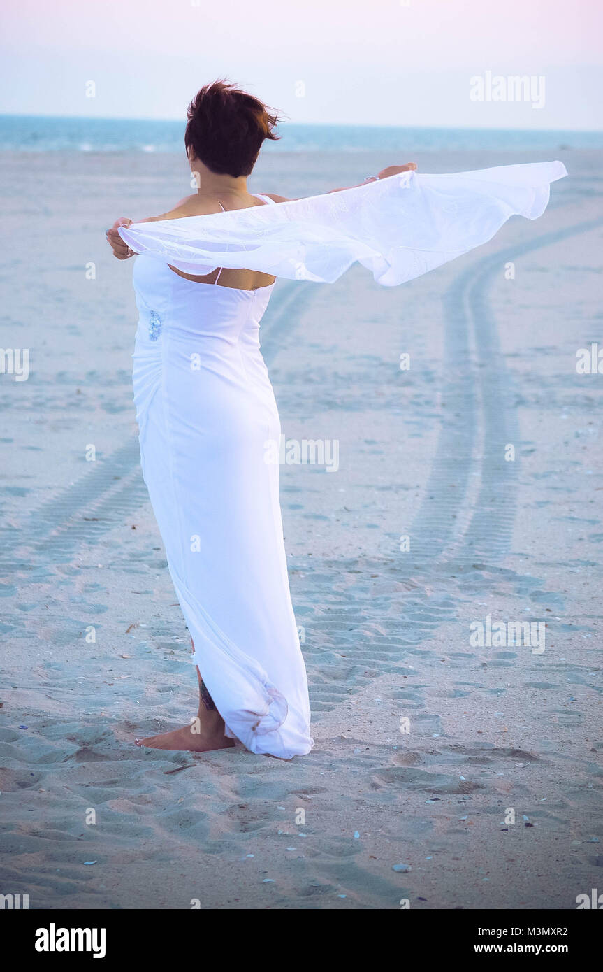 Bride on a Sandy Beach Stock Photo