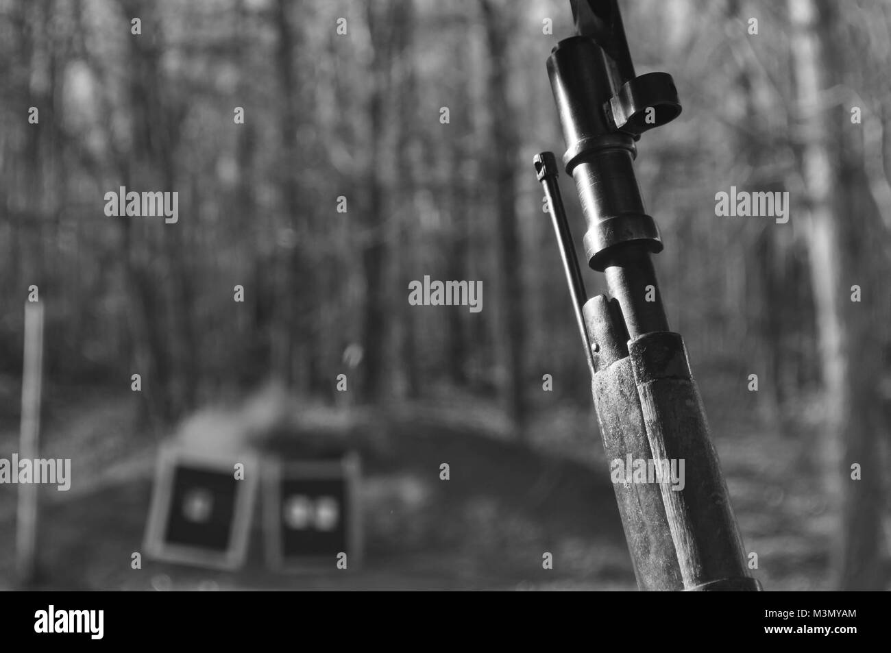 Black and White Image of a Mosin Nagant Gun Rifle at a Shooting Range Stock Photo