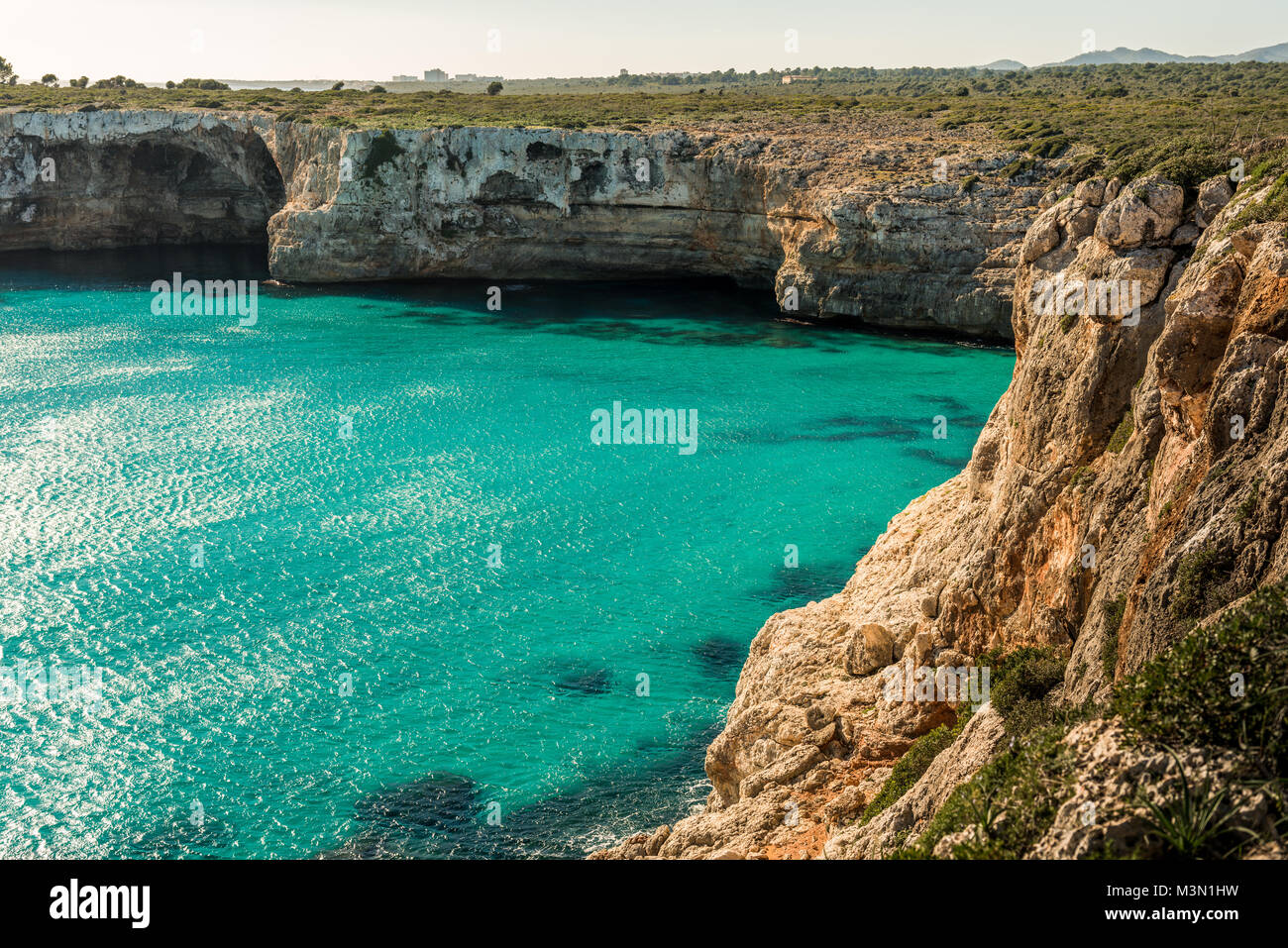 Cliffs, capes and coves of the mediterranean sea near Cala Falco on the ...