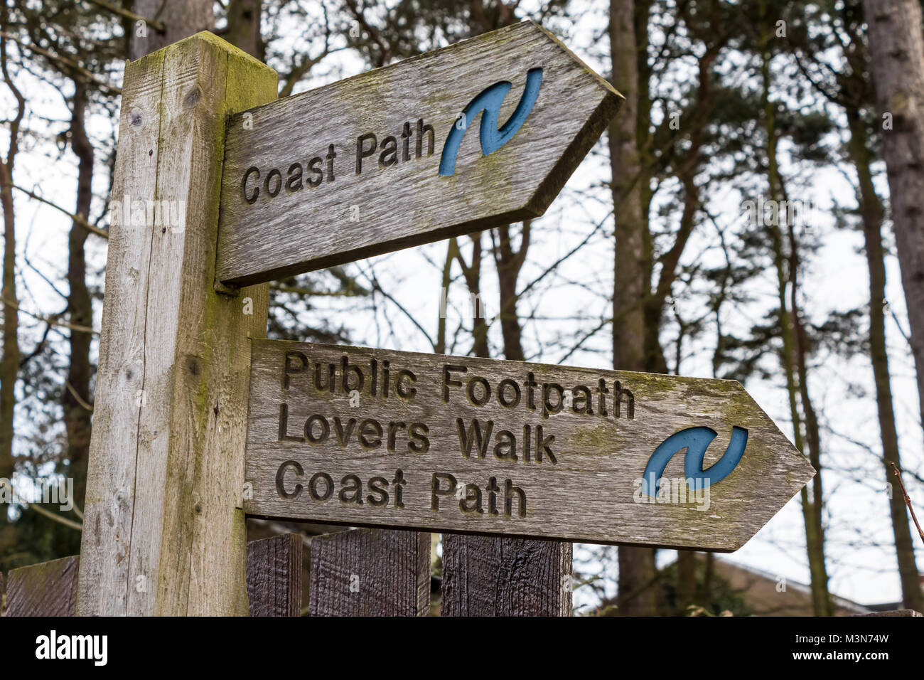 Two direction signs for Lovers Walk and Coast Path on the Northumberland Coast Long Distance Footpath Stock Photo