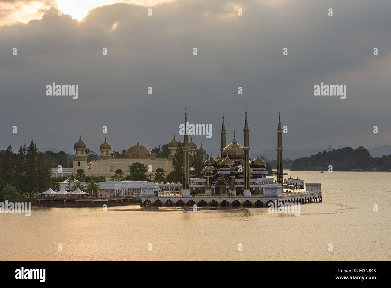 The floating Crystal Mosque or Masjid Kristal in Kuala Terengganu, Malaysia in the river just off of a man made island. Stock Photo