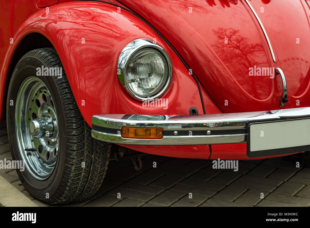 Red retro car stands outdoors Stock Photo Alamy
