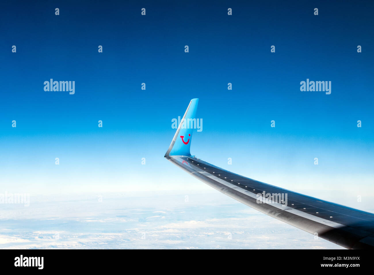 The wing of a TUI (Thomson) package holiday plane Stock Photo Alamy