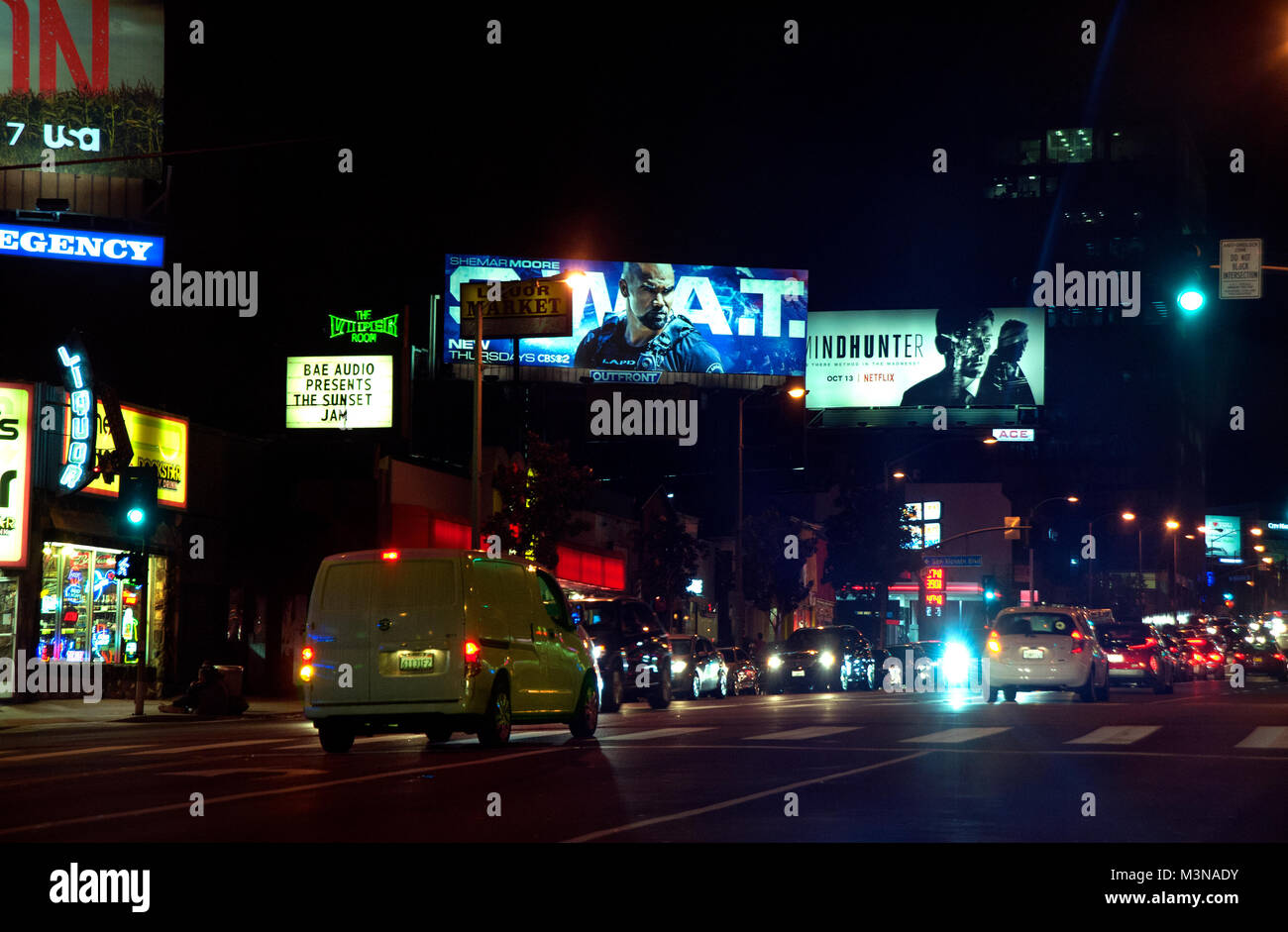 Billboards on the Sunset Strip at night in Los Angeles, CA Stock Photo