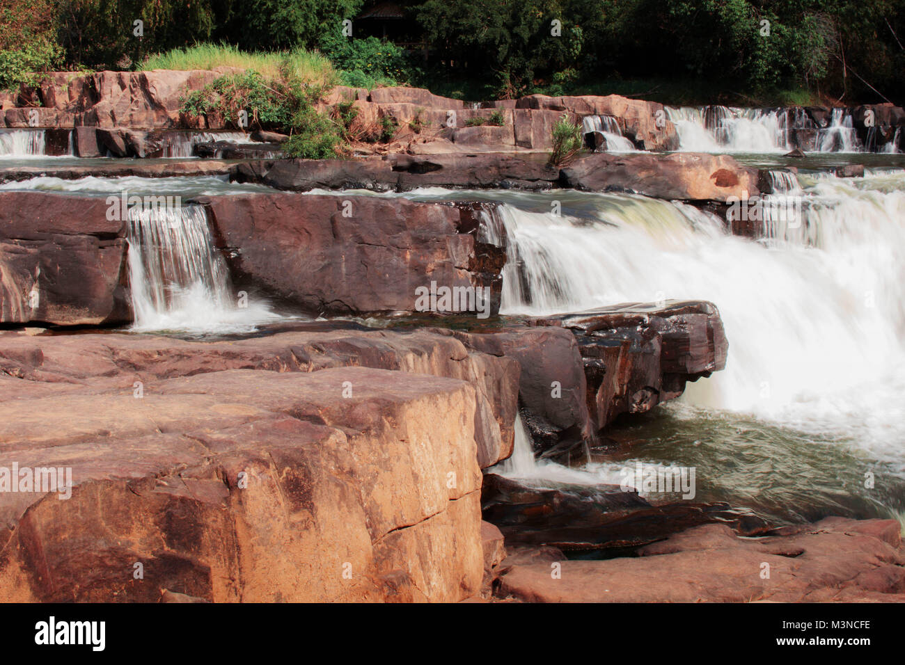 Rocks and waterfalls in the forest Stock Photo - Alamy
