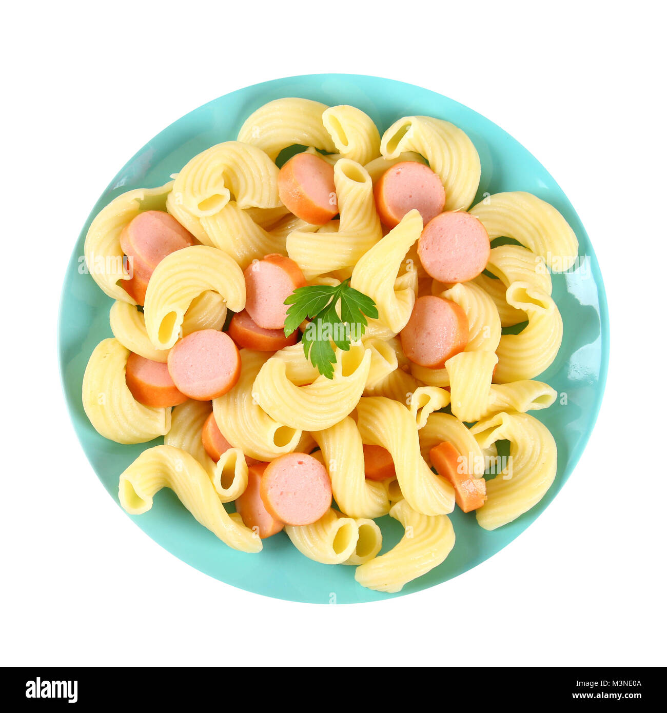 Macaroni with sausages on a blue plate isolated on white background Stock Photo