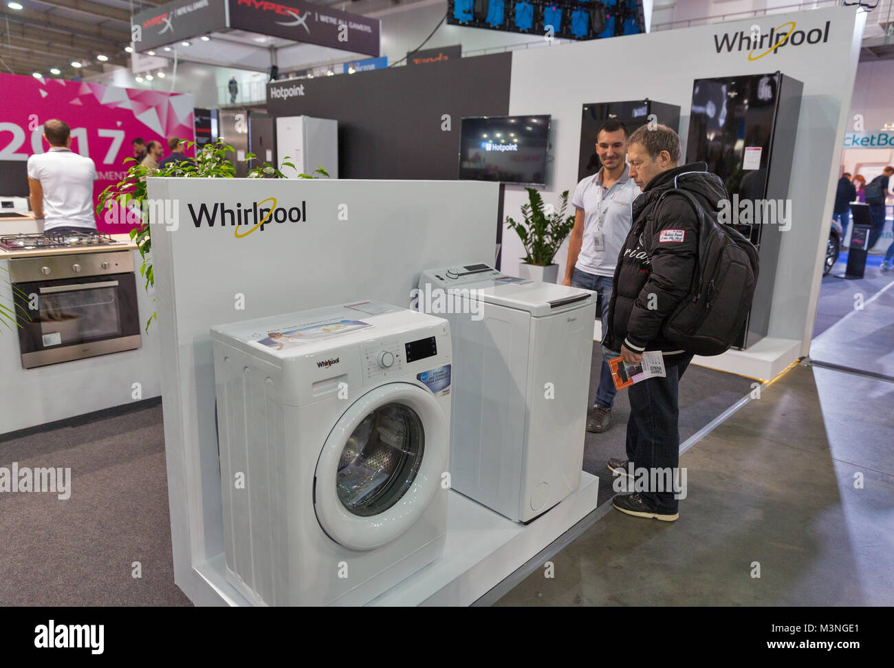 KIEV, UKRAINE - OCTOBER 07, 2017: People visit Whirlpool, American multinational manufacturer of home appliances booth during CEE 2017, largest electr Stock Photo