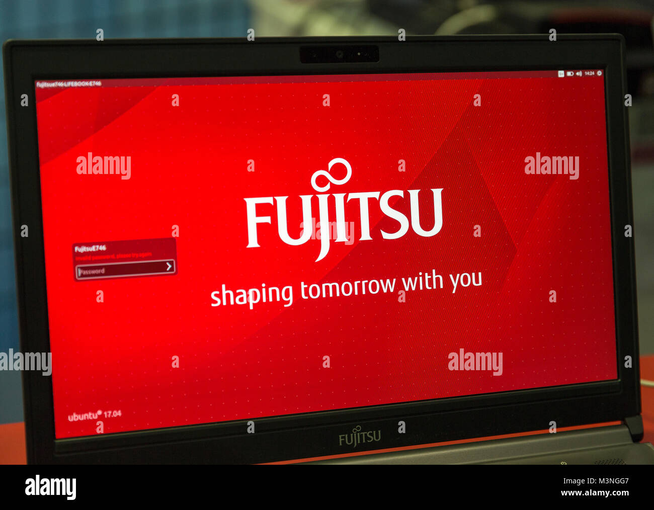 KIEV, UKRAINE - OCTOBER 07, 2017: Logo Fujitsu closeup, a Japanese multinational information technology equipment and services company booth at CEE 20 Stock Photo