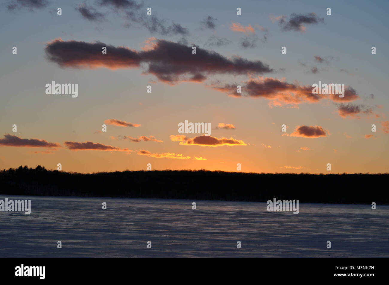 Golden Sunset Over a Lake Stock Photo - Alamy