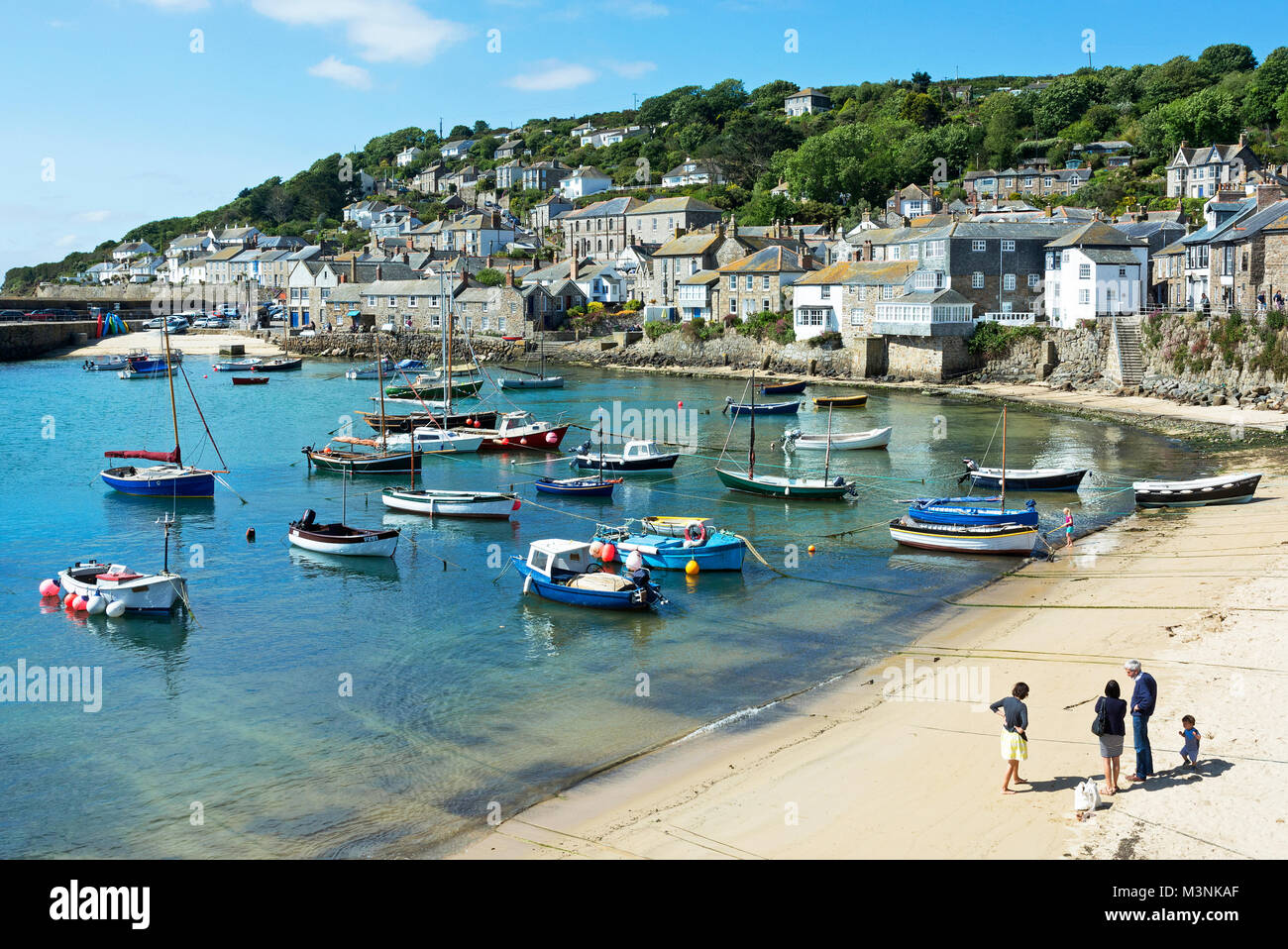fishing boats in the harbour at mousehole, cornwall, england, britain, uk. Stock Photo