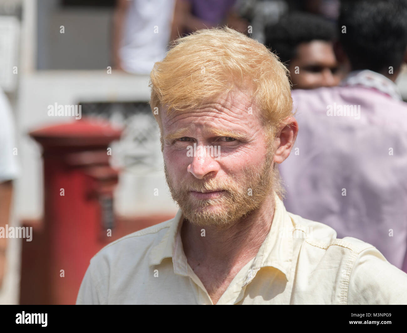 Albino man Indian hindu blonde white parade Matale Sri Lanka Stock Photo