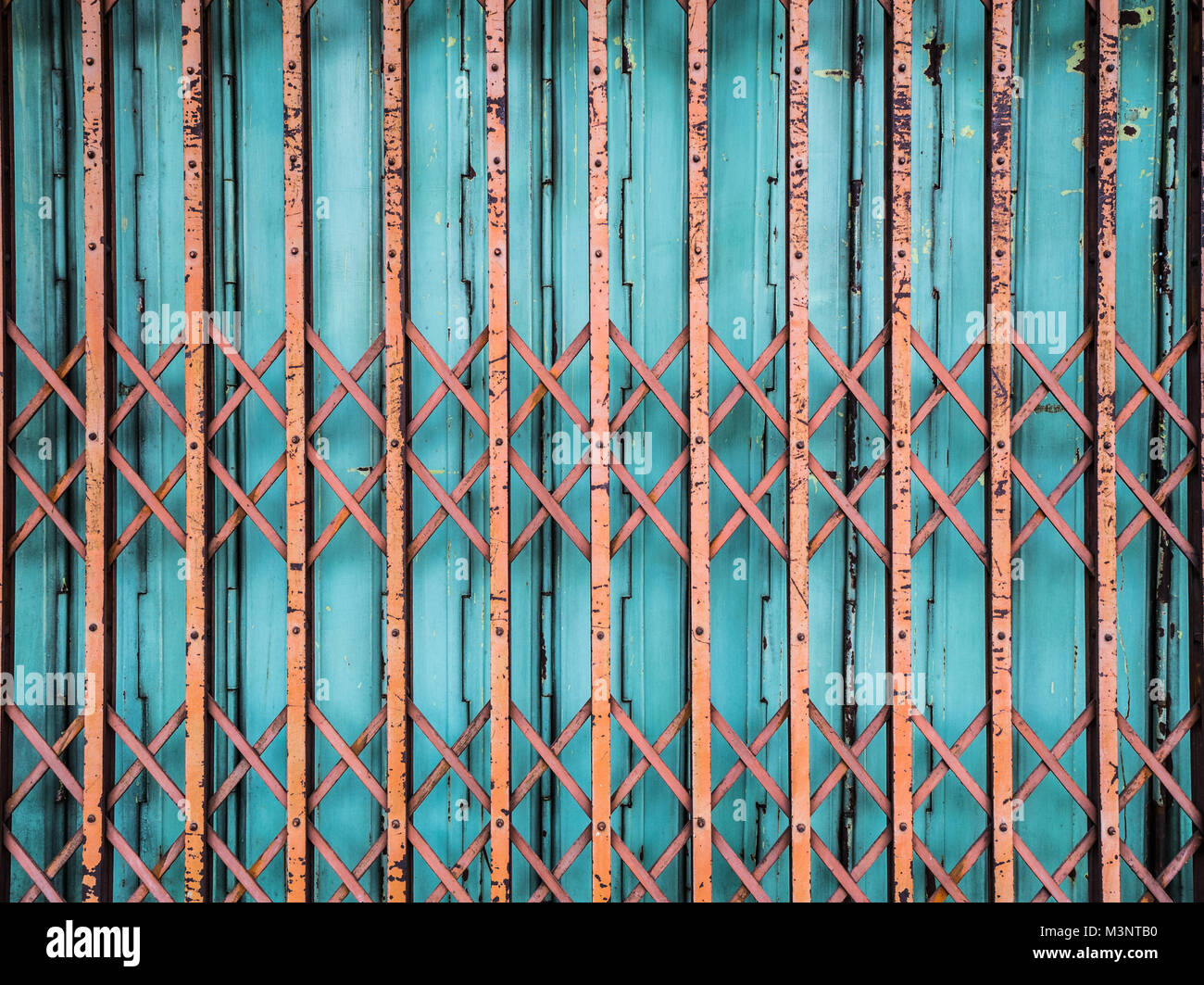Old Vibrant Sliding Steel Gate Stock Photo