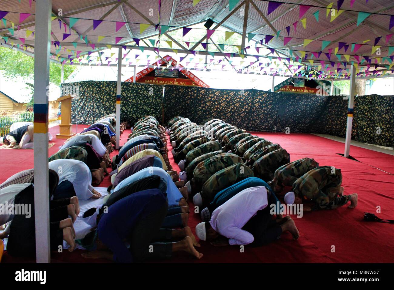 Army men praying Jashn e Wular Festival, Kashmir, India, Asia Stock Photo
