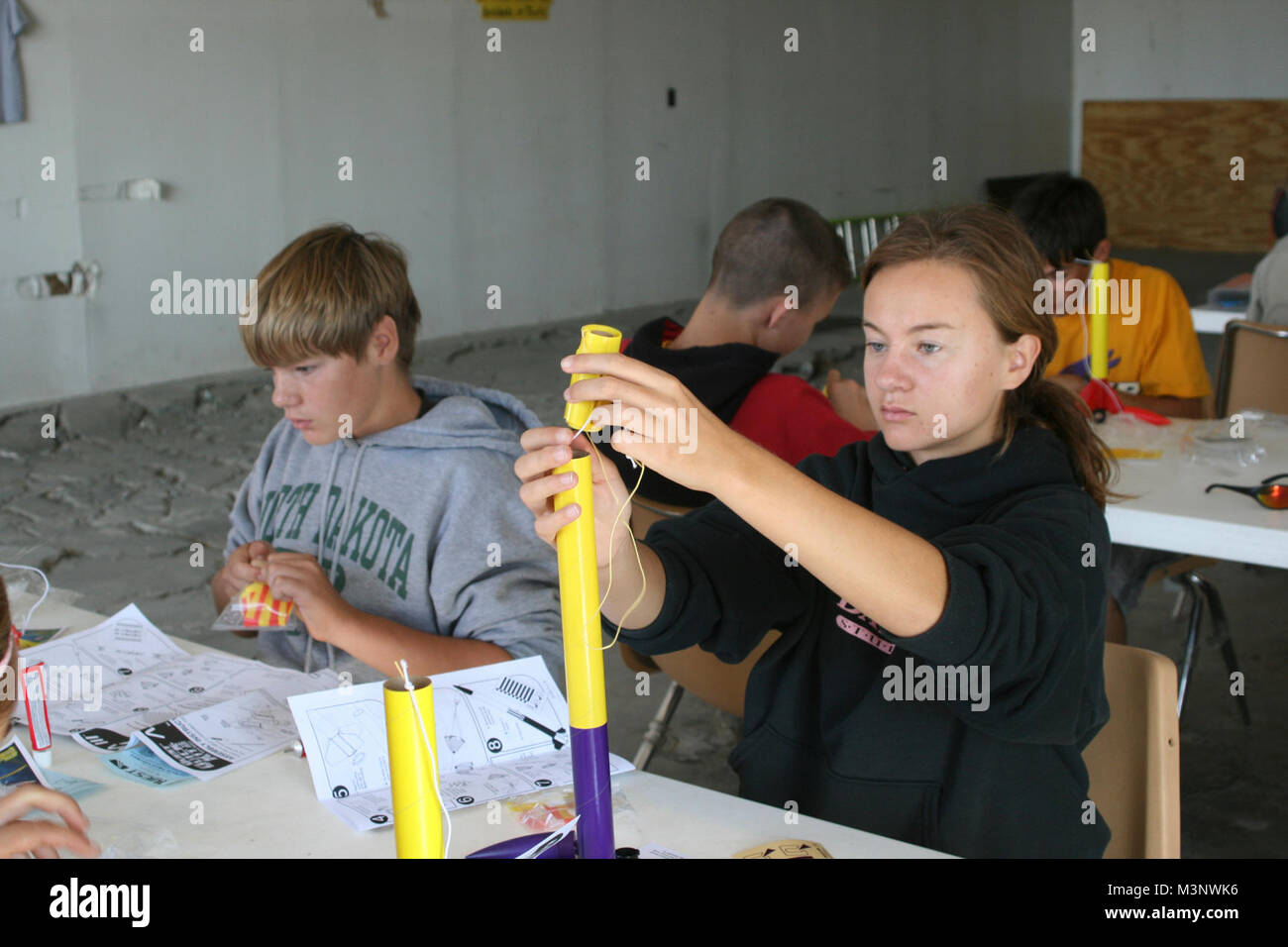 Cadets from the Civil Air Patrol build rockets at the workshop Stock ...