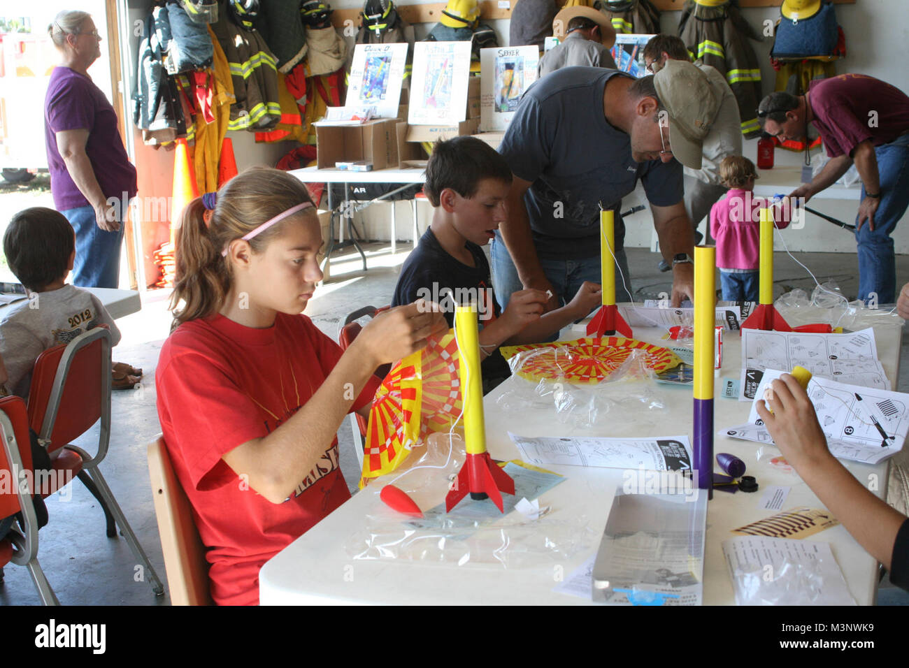Cadets from the Civil Air Patrol build rockets at the workshop Stock ...