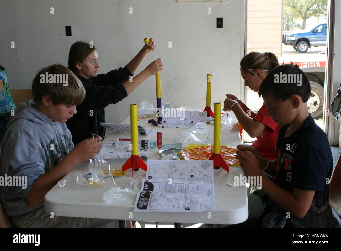 Cadets from the Civil Air Patrol build rockets at the workshop Stock ...