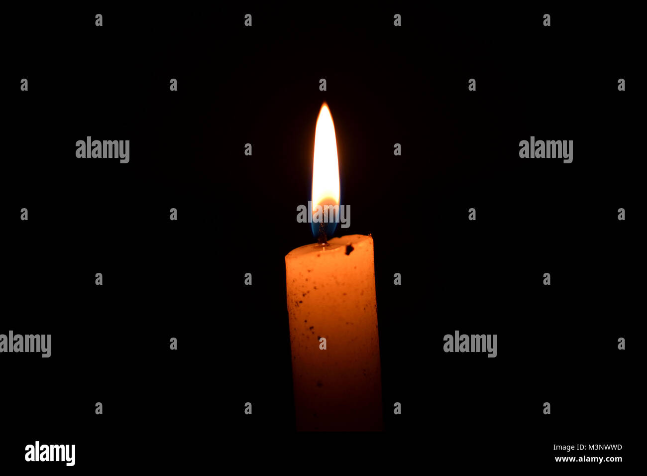 A Candle in the Dark Stock Photo Alamy