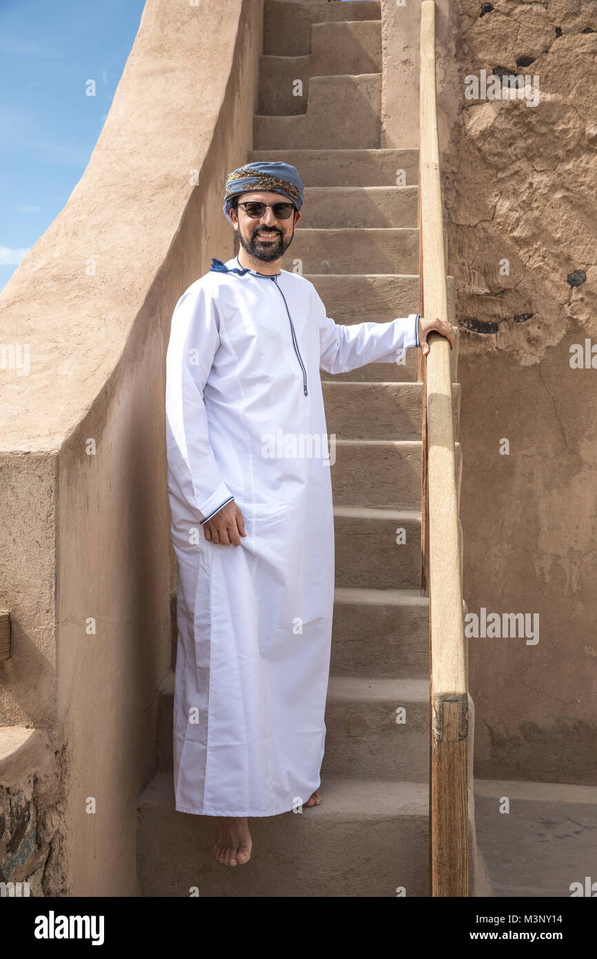 arab man in traditional omani outfit in an old castle Stock Photo
