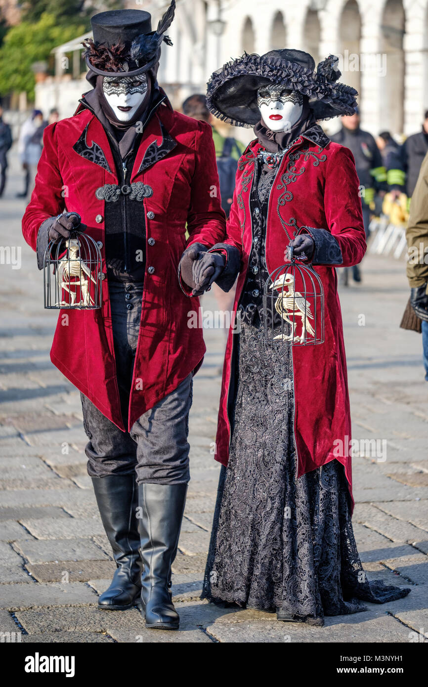 Man and woman masked for the Carnival of Venice 2018. Venice, Italy. February 4, 2018 Stock Photo