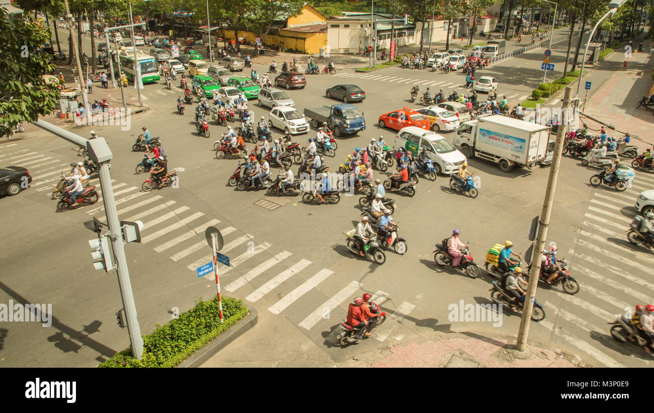 Crossing The Road In Vietnam Stock Photo - Download Image Now